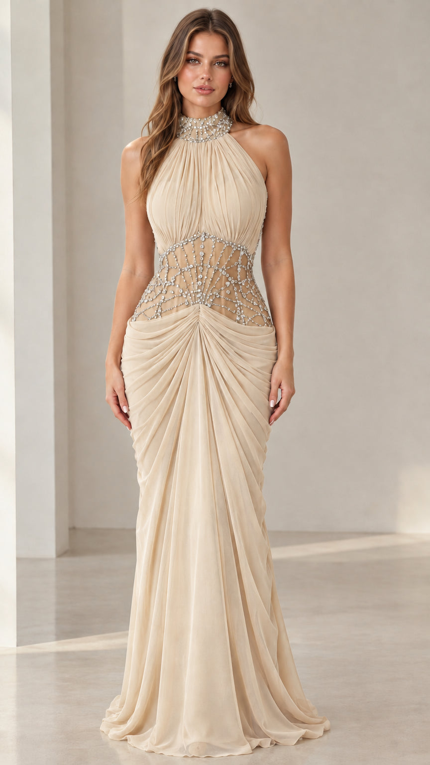 Front view of champagne beige halter neck beaded illusion evening gown
