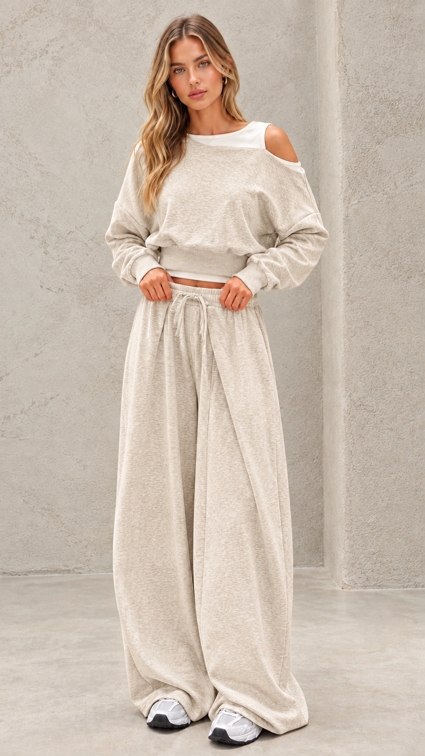 Full-length view of model wearing oatmeal beige cold shoulder lounge set