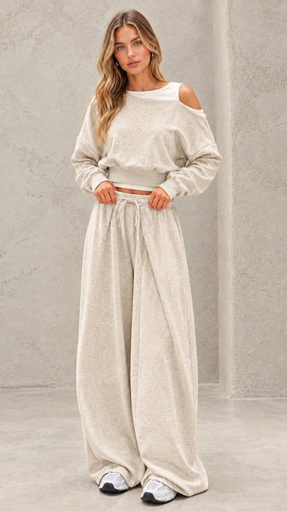 Full-length view of model wearing oatmeal beige cold shoulder lounge set